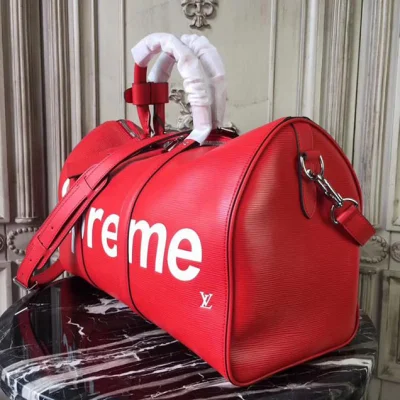 Сумка Louis Vuitton x Supreme Keepall Bandouliere 45 M53419 Epi Leather "Red" фото № 3 Сумка Louis Vuitton x Supreme Keepall Bandouliere 45 M53419 Epi Leather "Red" фото № 3