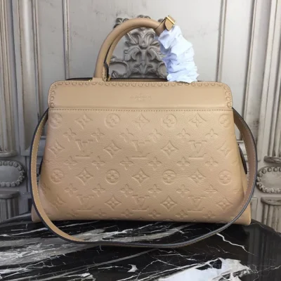 Сумка Louis Vuitton M44246 Vosges MM Monogram Empreinte Leather Papyrus "Beige" фото № 5
