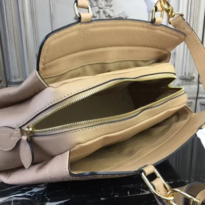 Сумка Louis Vuitton M44246 Vosges MM Monogram Empreinte Leather Papyrus "Beige" фото № 9