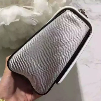 Сумка Louis Vuitton M53011 Twist MM Shoulder Bag Epi Leather "White" фото № 5 Сумка Louis Vuitton M53011 Twist MM Shoulder Bag Epi Leather "White" фото № 5