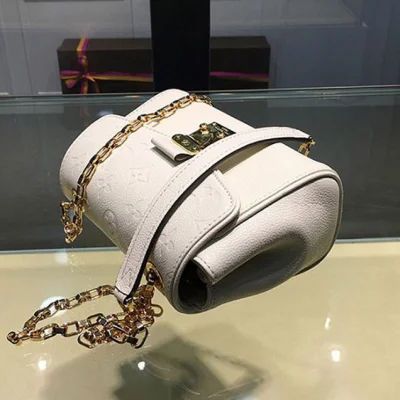 Сумка Louis Vuitton M94556 Saint-Germain BB Crossbody Bag Monogram Empreinte Leather "White" фото № 5