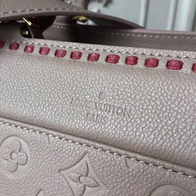 Сумка Louis Vuitton Vosges MM M43739 Monogram Empreinte Leather "Beige" фото № 6 Сумка Louis Vuitton Vosges MM M43739 Monogram Empreinte Leather "Beige" фото № 6