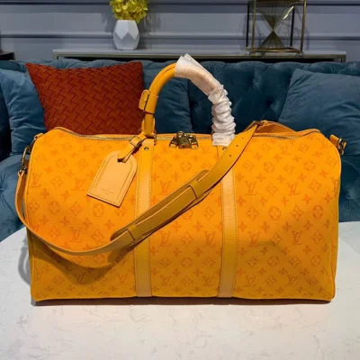Сумка Louis Vuitton Keepall Bandouliere 50 M44644 Monogram Denim Ochre Yellow "Orange" фото № 2 Сумка Louis Vuitton Keepall Bandouliere 50 M44644 Monogram Denim Ochre Yellow "Orange" фото № 2