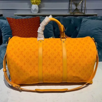 Сумка Louis Vuitton Keepall Bandouliere 50 M44644 Monogram Denim Ochre Yellow "Orange" фото № 3 Сумка Louis Vuitton Keepall Bandouliere 50 M44644 Monogram Denim Ochre Yellow "Orange" фото № 3