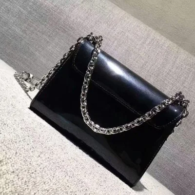 Сумка Louis Vuitton Twist PM M54243 Monogram Vernis "Black" фото № 3 Сумка Louis Vuitton Twist PM M54243 Monogram Vernis "Black" фото № 3