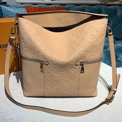 Сумка Louis Vuitton Melie M44247 Monogram Empreinte Leather Papyrus "Beige" фото № 2