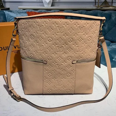 Сумка Louis Vuitton Melie M44247 Monogram Empreinte Leather Papyrus "Beige" фото № 4