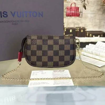 Сумка Louis Vuitton N41667 Mini Pochette Accessoires Damier Ebene Canvas "Brown" фото № 4