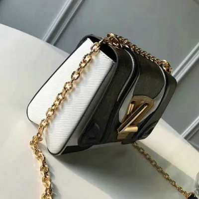 Сумка Louis Vuitton Twist MM M52581 Monogram Canvas "Brown" фото № 4 Сумка Louis Vuitton Twist MM M52581 Monogram Canvas "Brown" фото № 4