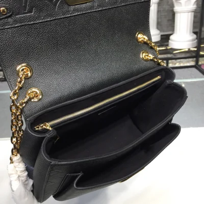 Сумка Louis Vuitton M44151 Vavin PM Monogram Empreinte Leather "Black" фото № 8