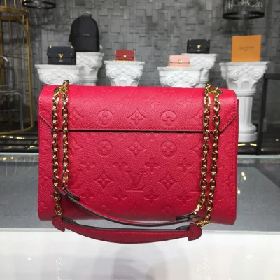 Сумка Louis Vuitton Vavin PM M43936 Monogram Empreinte Leather Scarlett "Red" фото № 4