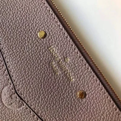 Клатч Louis Vuitton Monogram Empreinte Daily Pouch Clutch Bag Camel 2018 "Pink" фото № 3 Клатч Louis Vuitton Monogram Empreinte Daily Pouch Clutch Bag Camel 2018 "Pink" фото № 3