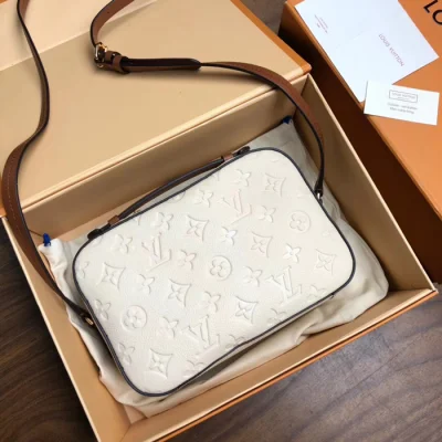 Сумка Louis Vuitton Saintonge M44597 Monogram Empreinte Leather Creme Caramel "Beige" фото № 4