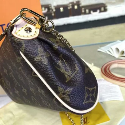 Сумка Louis Vuitton M95567 Eva Clutch Monogram Canvas "Brown" фото № 6 Сумка Louis Vuitton M95567 Eva Clutch Monogram Canvas "Brown" фото № 6