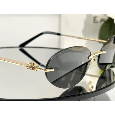 Солнцезащитные очки Balenciaga No Frame Thin Temples "Black/Gold" фото № 5