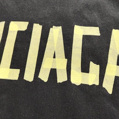 Футболка Balenciaga With A Yellow Logo "Black" фото № 9