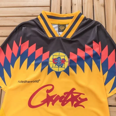 Футболка Corteiz Chisel Colorful Rombs And Collar Decorated By Stripes "Yellow" фото № 2 Футболка Corteiz Chisel Colorful Rombs And Collar Decorated By Stripes "Yellow" фото № 2