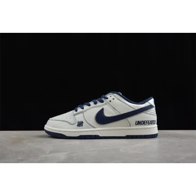 Undefeated x Nike SB Dunk Low "White/Blue" фото № 2