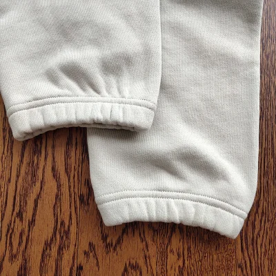 Спортивные Штаны Fear of God Essentials Insulated 1977 "White" фото № 4 Спортивные Штаны Fear of God Essentials Insulated 1977 "White" фото № 4