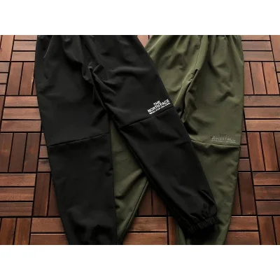 Спортивные штаны The North Face Stripe And Logo On Knees "Black" фото № 2