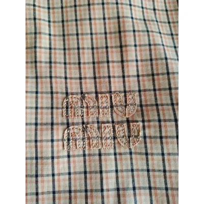 Куртка-бомбер Miu Miu Checked Print Light Brown Logo "Brown" фото № 4 Куртка-бомбер Miu Miu Checked Print Light Brown Logo "Brown" фото № 4