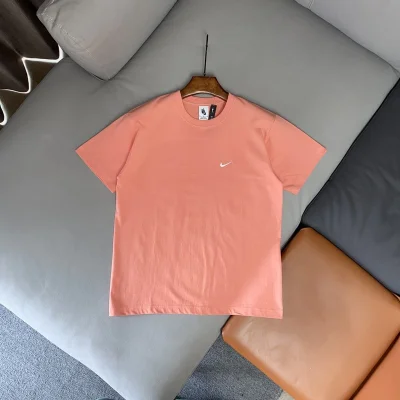 Футболка Nike Logo In The Form Of Tick "Peach" фото № 2