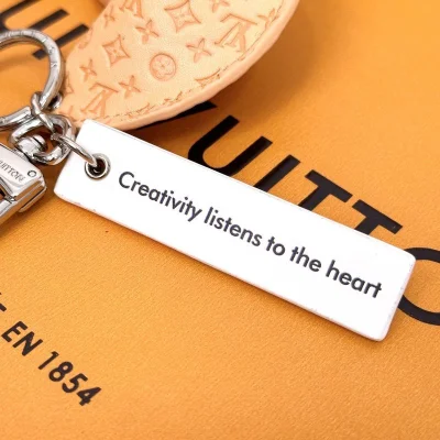 Брелок Louis Vuitton Shaped Like Ears "Beige" фото № 3