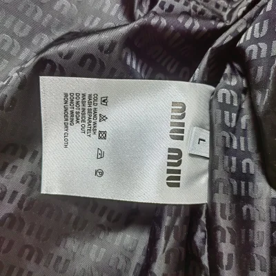 Пуховик Miu Miu Urban Noir "Black" фото № 2 Пуховик Miu Miu Urban Noir "Black" фото № 2