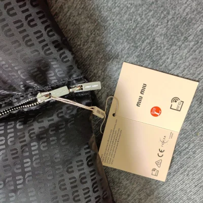 Пуховик Miu Miu Urban Noir "Black" фото № 4 Пуховик Miu Miu Urban Noir "Black" фото № 4