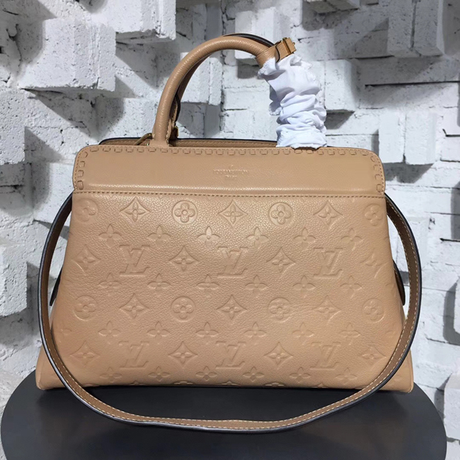 Сумка Louis Vuitton M44246 Vosges MM Monogram Empreinte Leather Papyrus "Beige" фото № 2