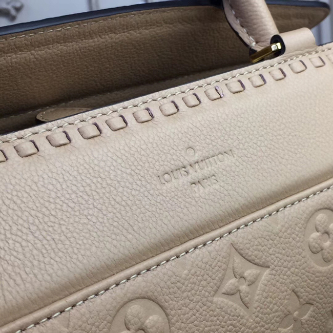 Сумка Louis Vuitton M44246 Vosges MM Monogram Empreinte Leather Papyrus "Beige" фото № 6