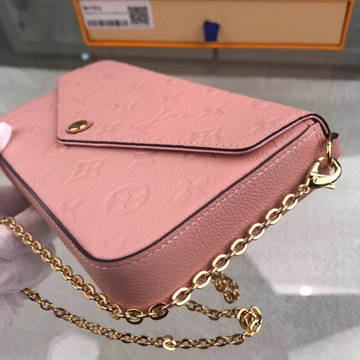 Сумка Louis Vuitton Pochette Felicie M67856 Monogram Empreinte Leather Rose Poudre "Pink" фото № 6