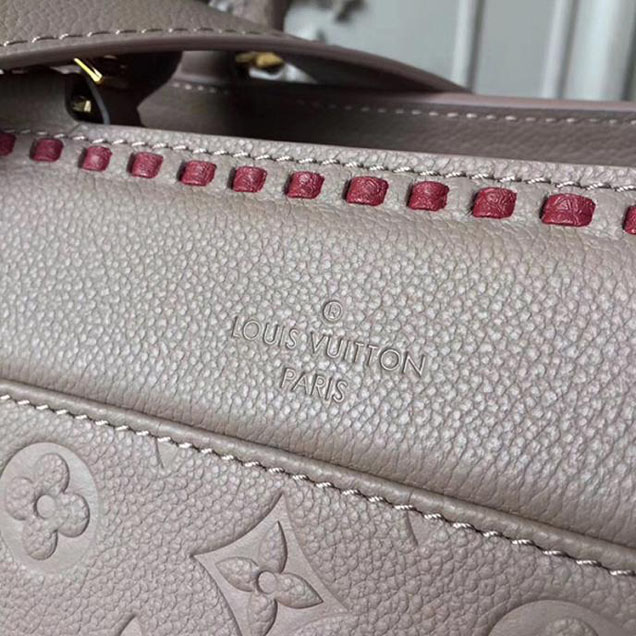 Сумка Louis Vuitton Vosges MM M43739 Monogram Empreinte Leather "Beige" фото № 6