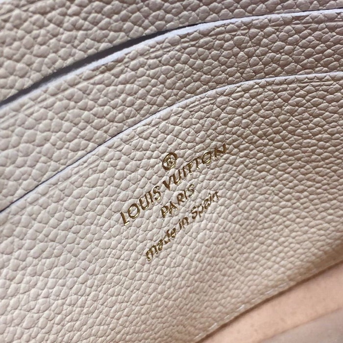 Сумка Louis Vuitton Pochette Double Zip M63919 Monogram Empreinte Leather Dore "Beige" фото № 9