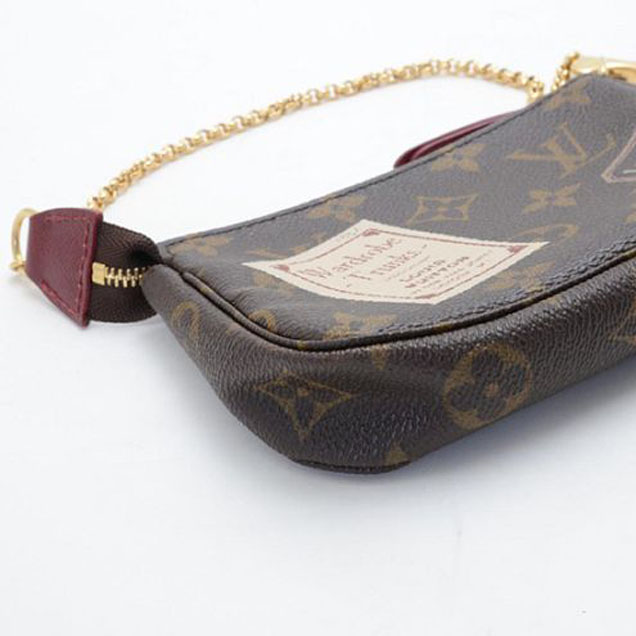 Сумка Louis Vuitton M63798 Pochette Accessoires Stamp Monogram Canvas "Brown" фото № 8