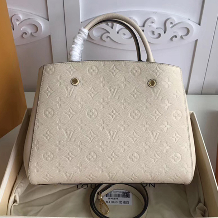 Сумка Louis Vuitton Montaigne MM M44061 Monogram Empreinte Leather Creme "Beige" фото № 3