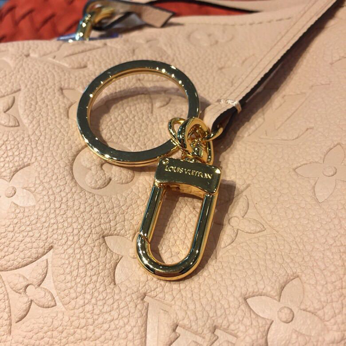 Сумка Louis Vuitton Artsy MM M44243 Monogram Empreinte Leather Papyrus "Beige" фото № 7