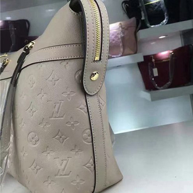 Сумка Louis Vuitton M51759 Boetie Shoulder Bag Monogram Empreinte Leather "Beige" фото № 6