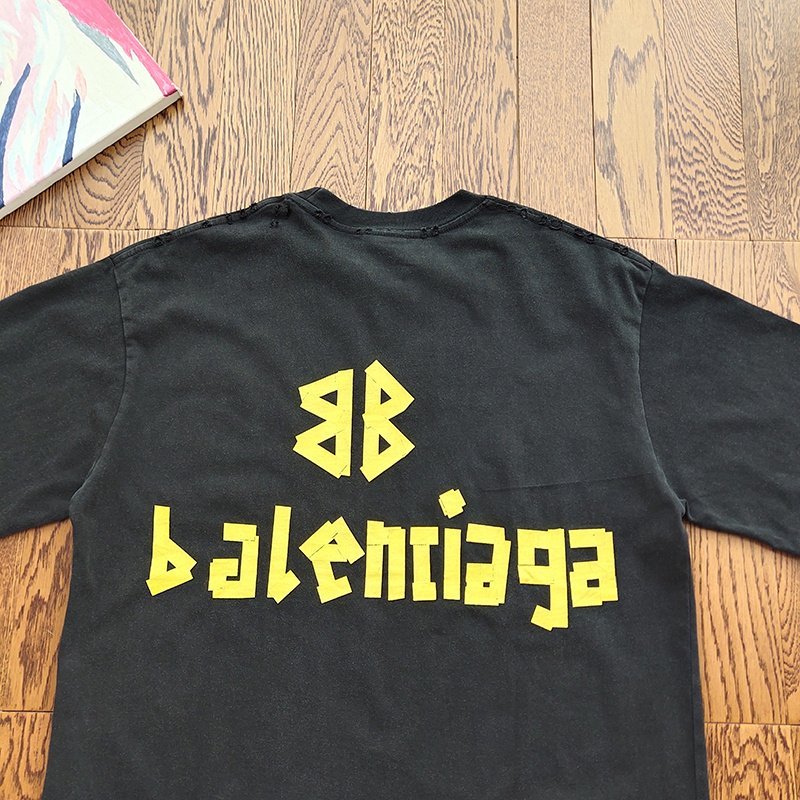 Футболка Balenciaga With A Yellow Logo "Black" фото № 6