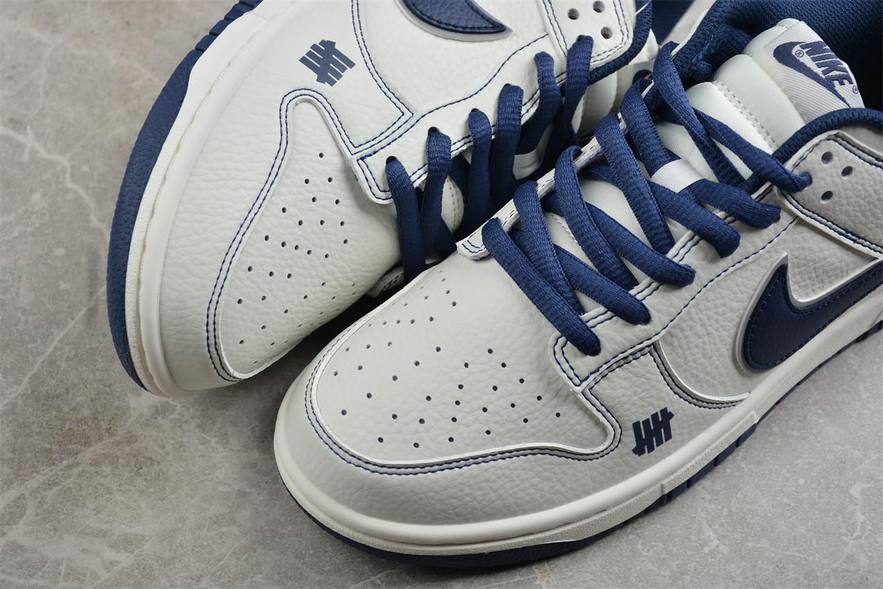 Undefeated x Nike SB Dunk Low "White/Blue" фото № 7