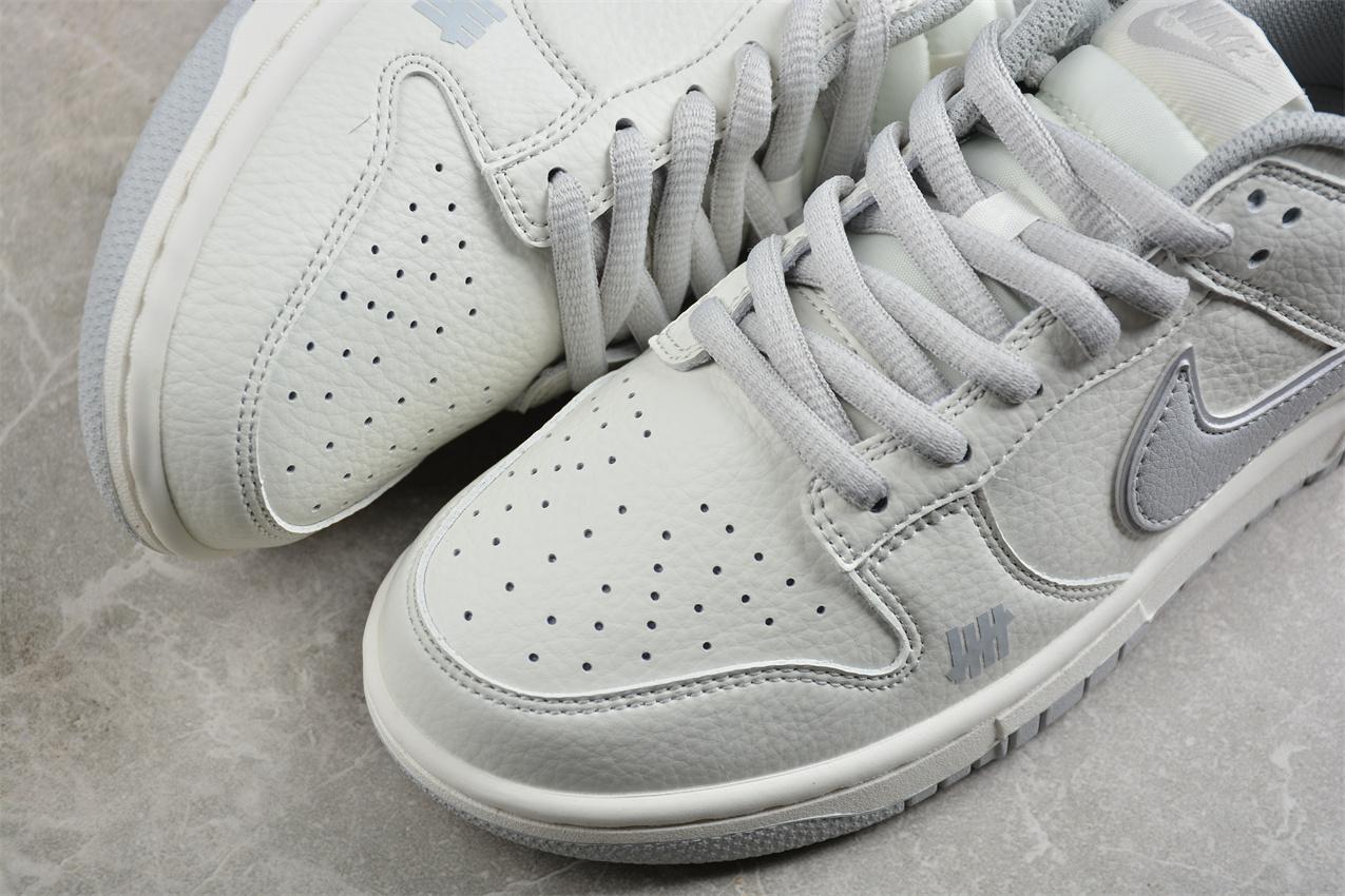 Undefeated x Nike SB Dunk Low "White/Grey" фото № 7