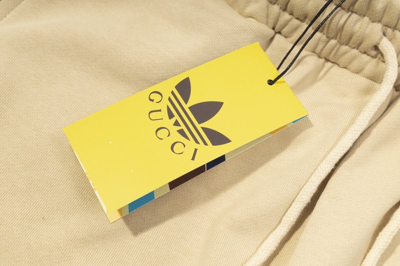 Штаны Gucci X Adidas Solid Color With Logo Reflection "Beige" фото № 6
