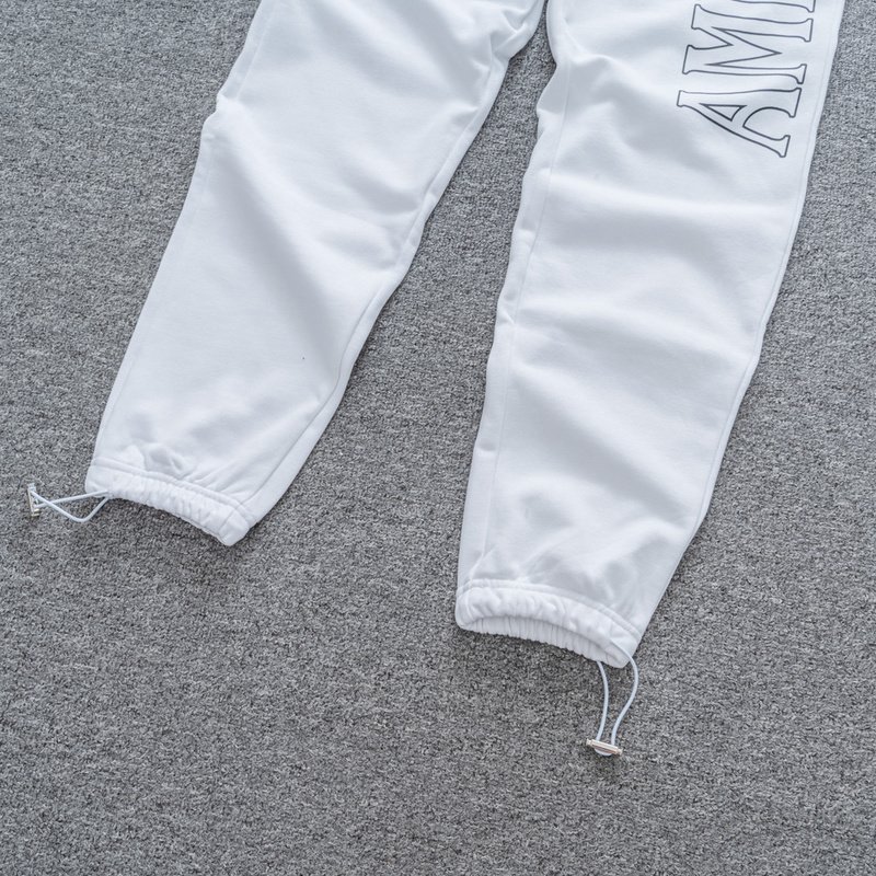 Штаны Amiri With Large Text Logo "White" фото № 7