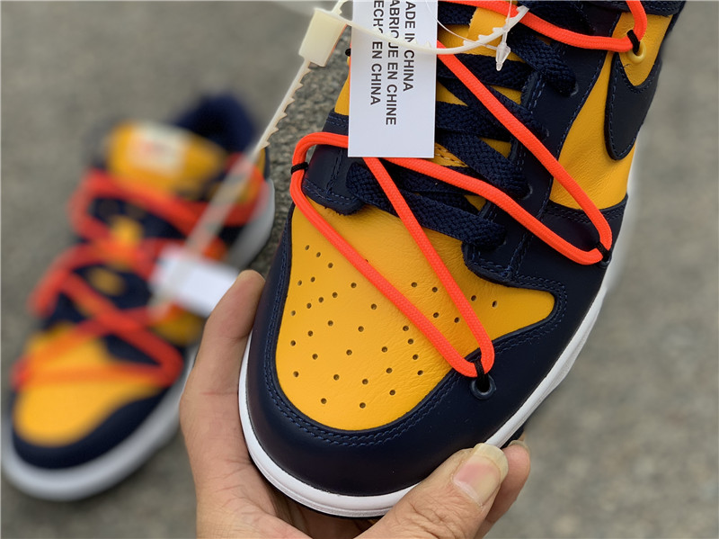 Off White x Nike Dunk Low "University Gold" фото № 7